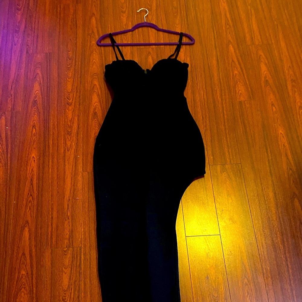 Black spandex and mesh. High thigh slit up side